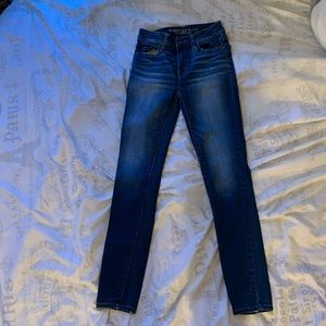 America eagle dark blue super super stretch jeans.